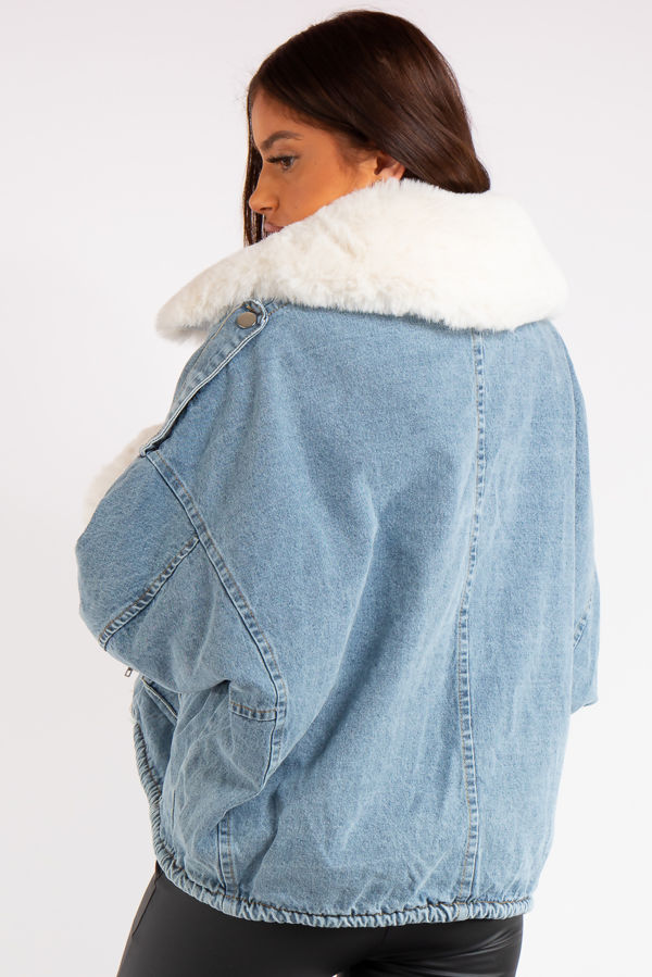 blue jacket with white fur